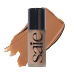 Saie Dew Bronze - Hydrating Liquid Bronzer Stick For a Sun Kissed Glow - Liquid Contour Stick Infused with Nourishing Skin Care Ingredients - Sculpted Face Makeup Essential - Sand (0.4 oz) - Image 2