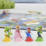 Monopoly Junior Super Mario Edition Board Game, Fun Kids' Ages 5 and Up, Explore The Mushroom Kingdom as Mario, Peach, Yoshi, or Luigi (Amazon Exclusive) - Image 7